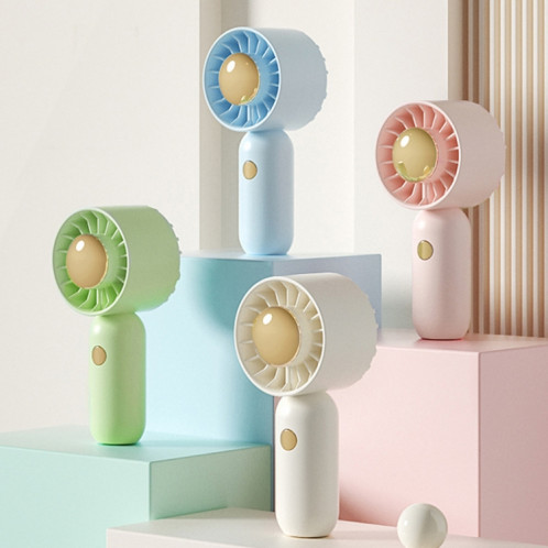 La main tient un petit ventilateur portable Mini ventilateur de poche, style : version de placage vert. SH4107828-010