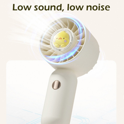 La main tient un petit ventilateur de poche portable, style : version rose avec placage par pulvérisation. SH4105485-010