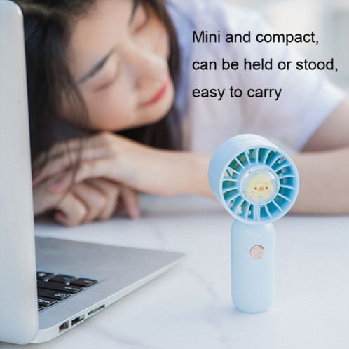 La main tient un petit ventilateur portable Mini ventilateur de poche, style : version de placage vert. SH4107828-010